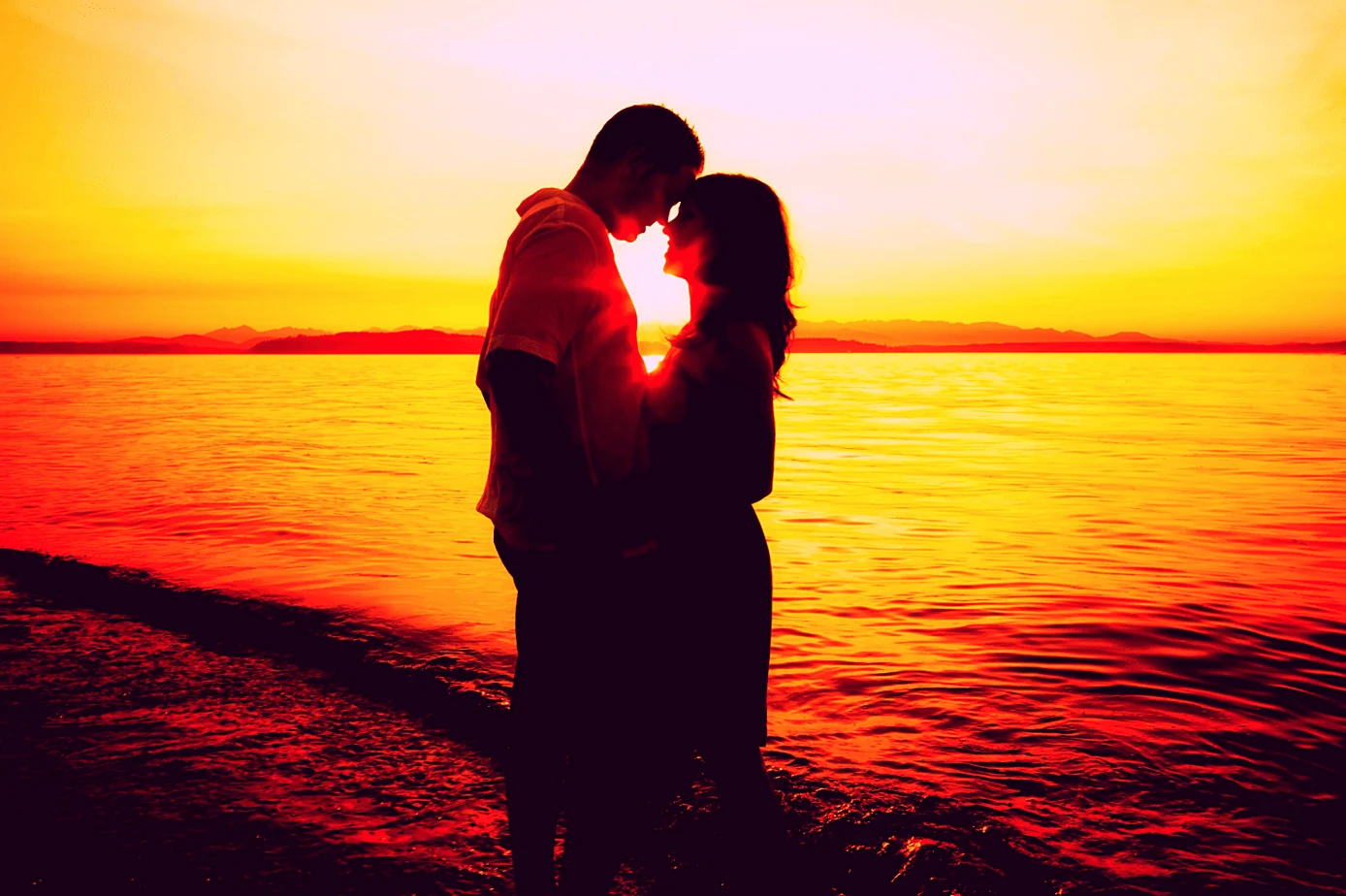 twin flame love on the beach in passionate sun silhouette