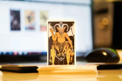 Defocused illustrative editorial tarot cards.